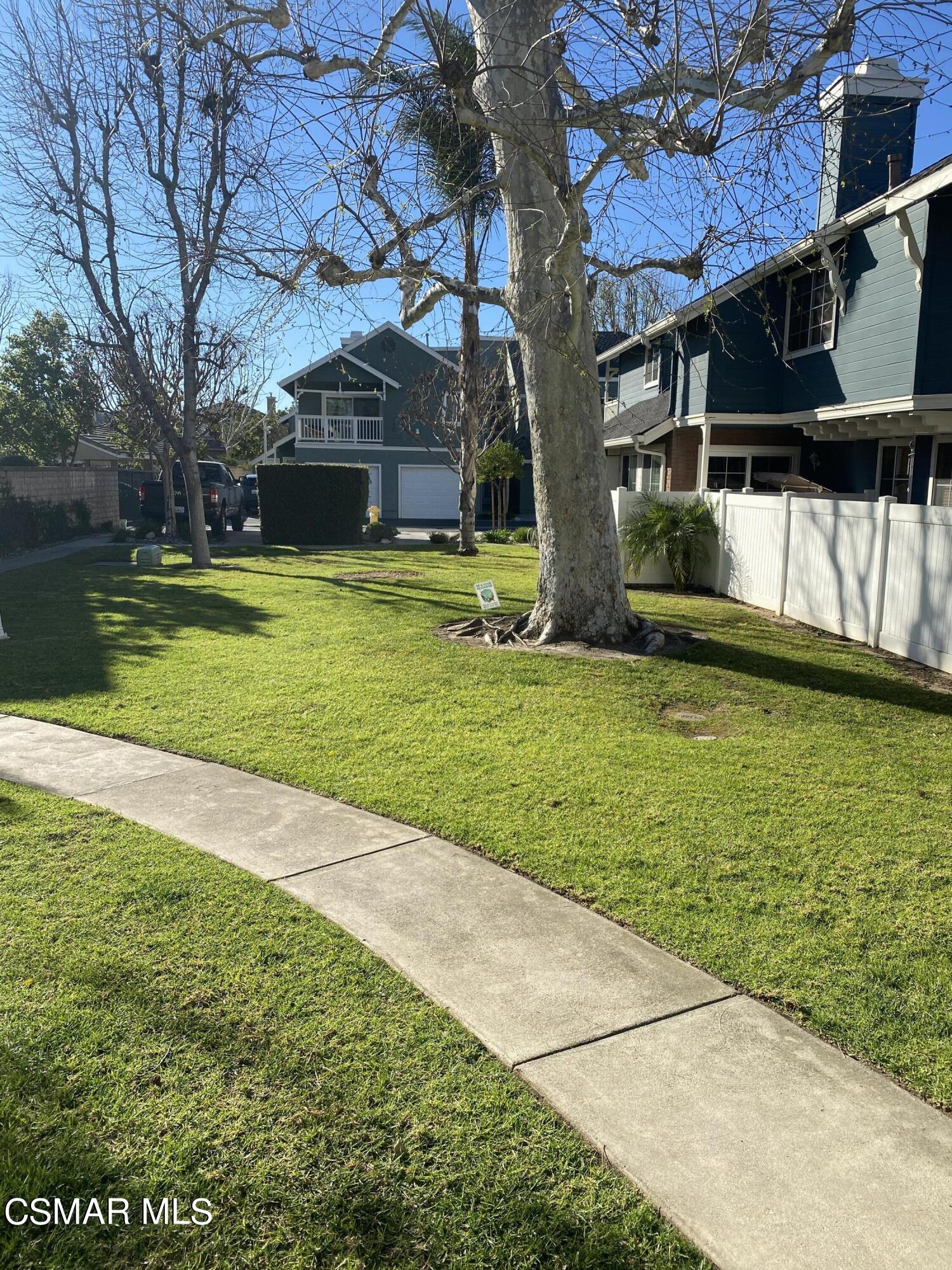 1842 Rory Lane, Unit 7 Simi Valley, CA 93063 - Photo 3 of 19 a view of a swimming pool with a yard