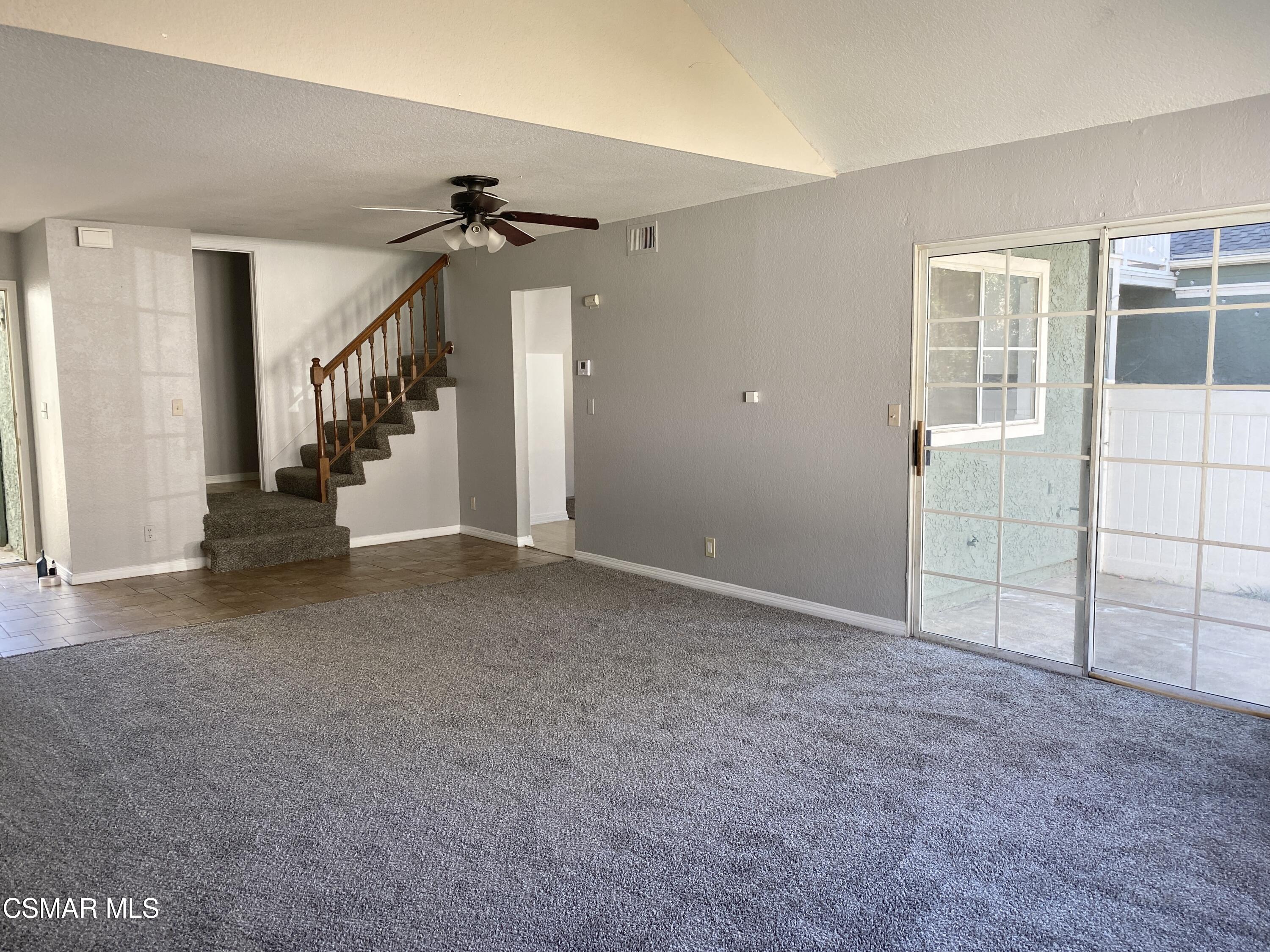 1842 Rory Lane, Unit 7 Simi Valley, CA 93063 - Photo 5 of 19 a view of a livingroom with staircase