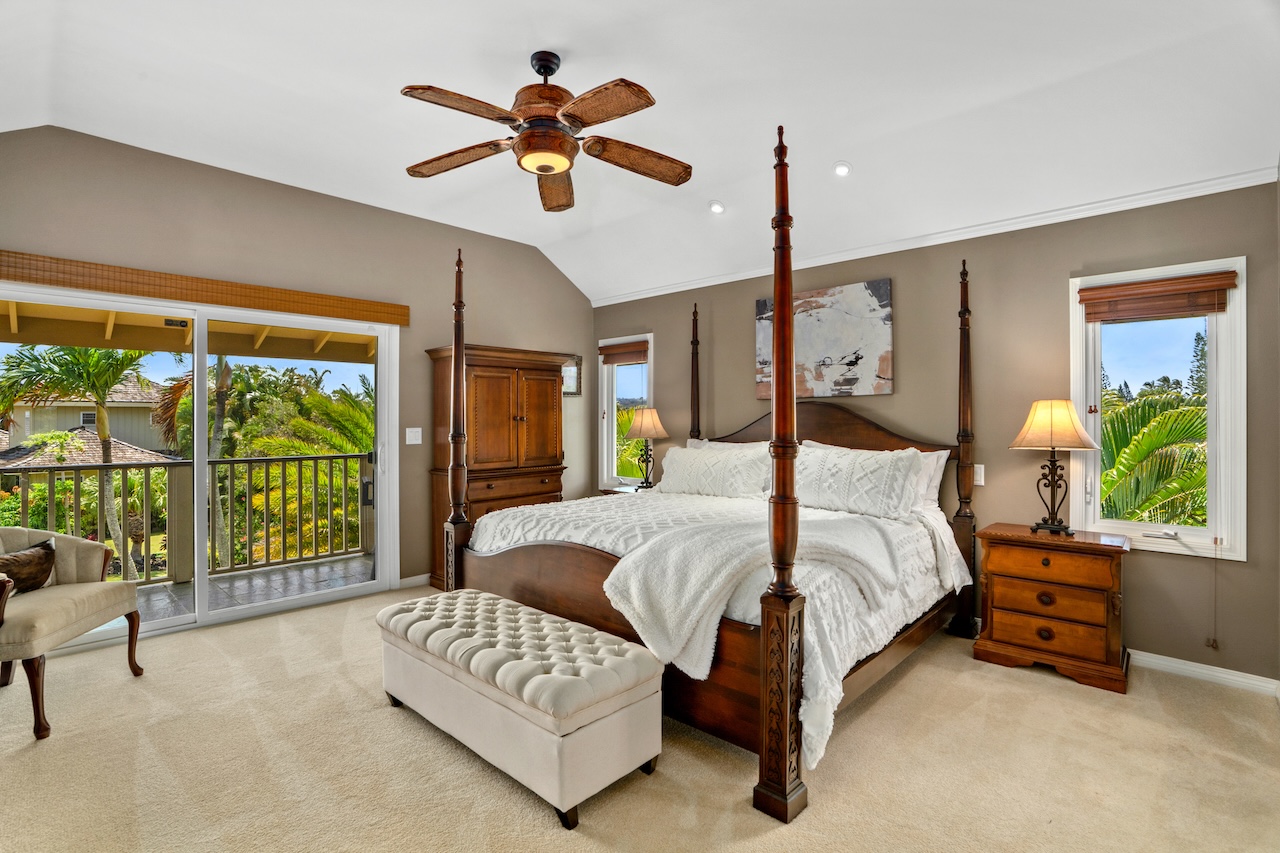 2889 Milo Hae Loop Koloa, HI 96756 - Photo 12 of 27 a bedroom with a bed and a large window