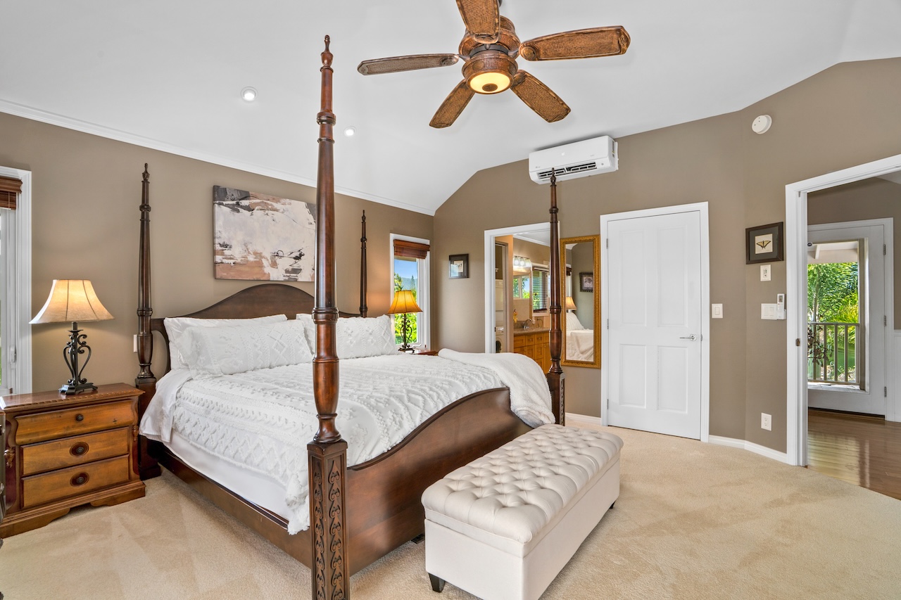 2889 Milo Hae Loop Koloa, HI 96756 - Photo 14 of 27 a bedroom with a bed a ceiling fan and a dresser