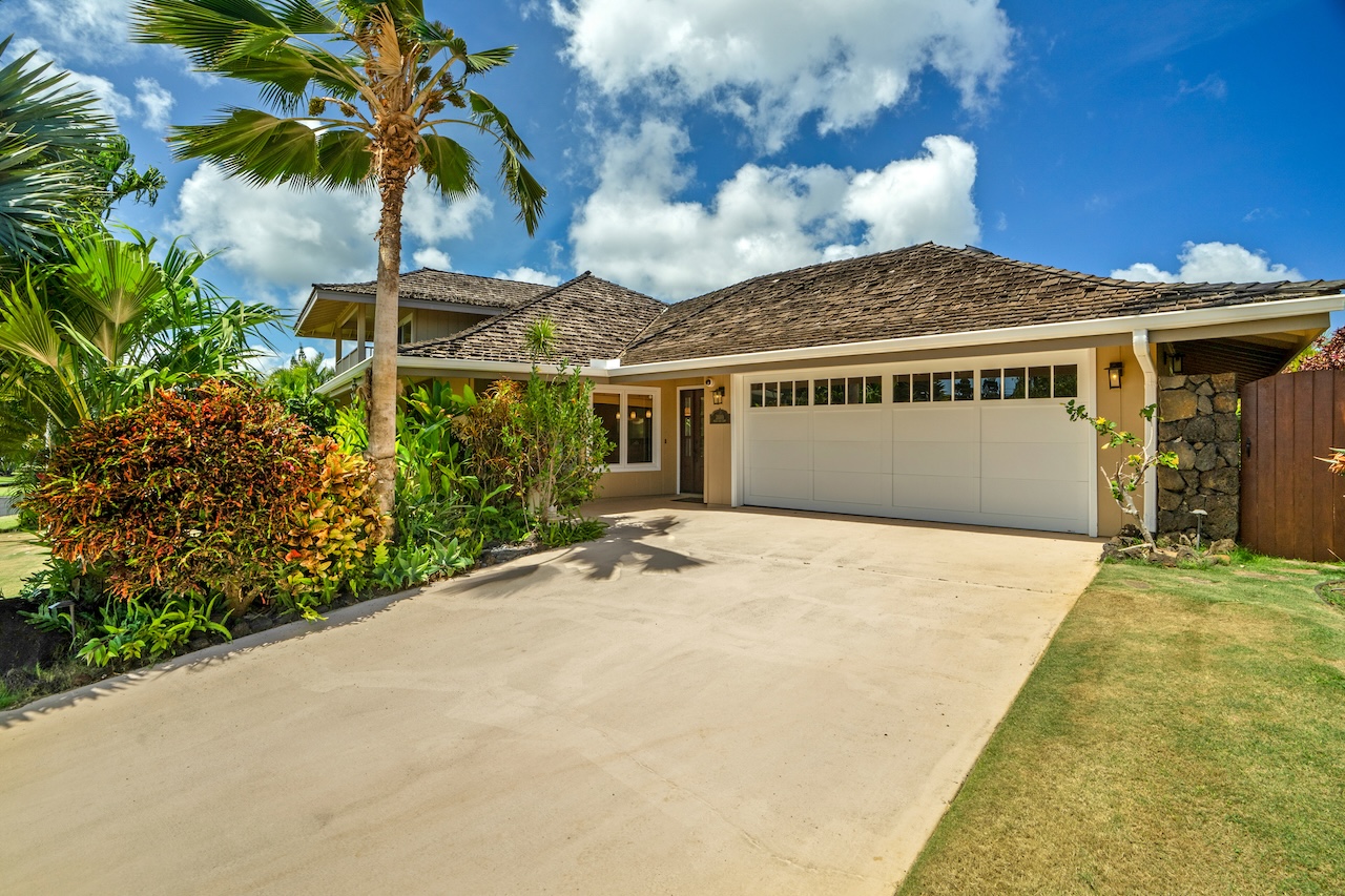 2889 Milo Hae Loop Koloa, HI 96756 - Photo 26 of 27 a front view of a house with a garden