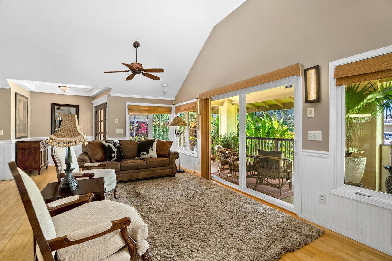 2889 Milo Hae Loop Koloa, HI 96756 - Photo 4 of 27 a living room with furniture and a large window