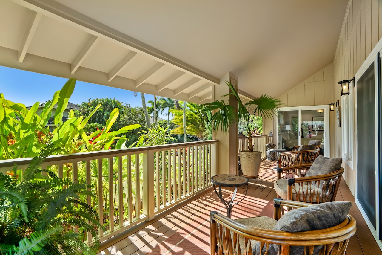 2889 Milo Hae Loop Koloa, HI 96756 - Photo 5 of 27 a balcony with table and chairs