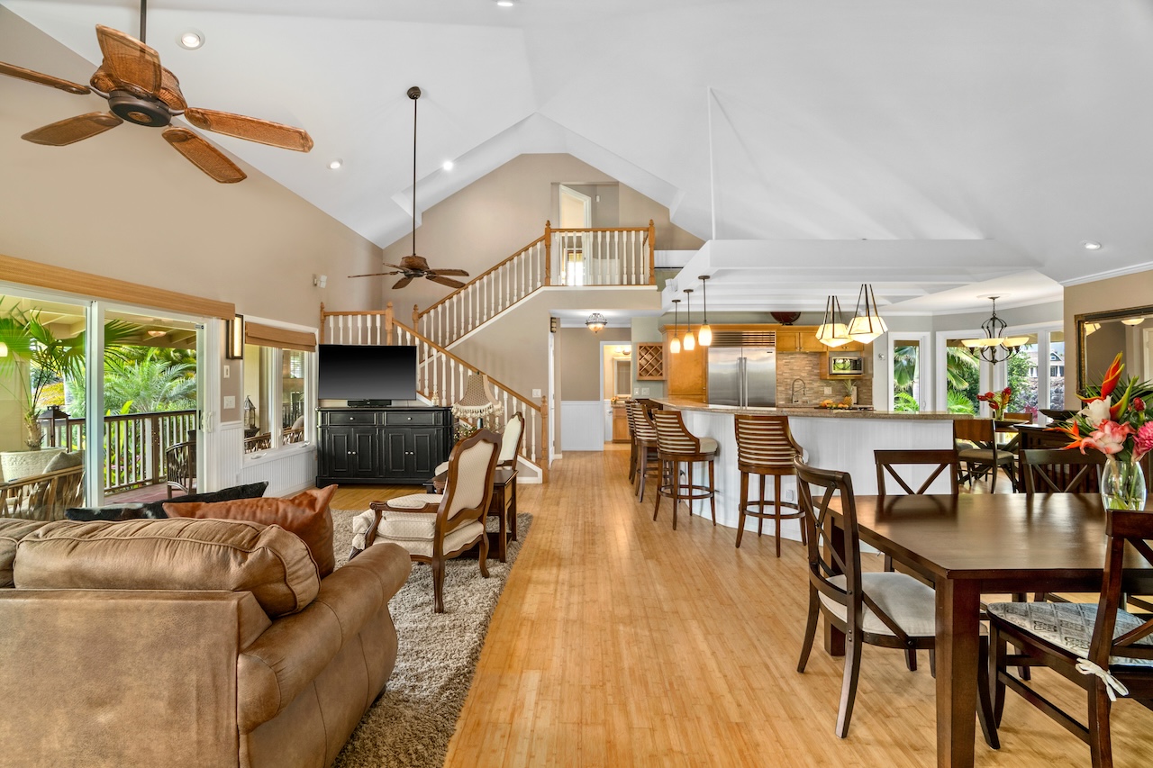 2889 Milo Hae Loop Koloa, HI 96756 - Photo 6 of 27 a living room with lots of furniture and a chandelier