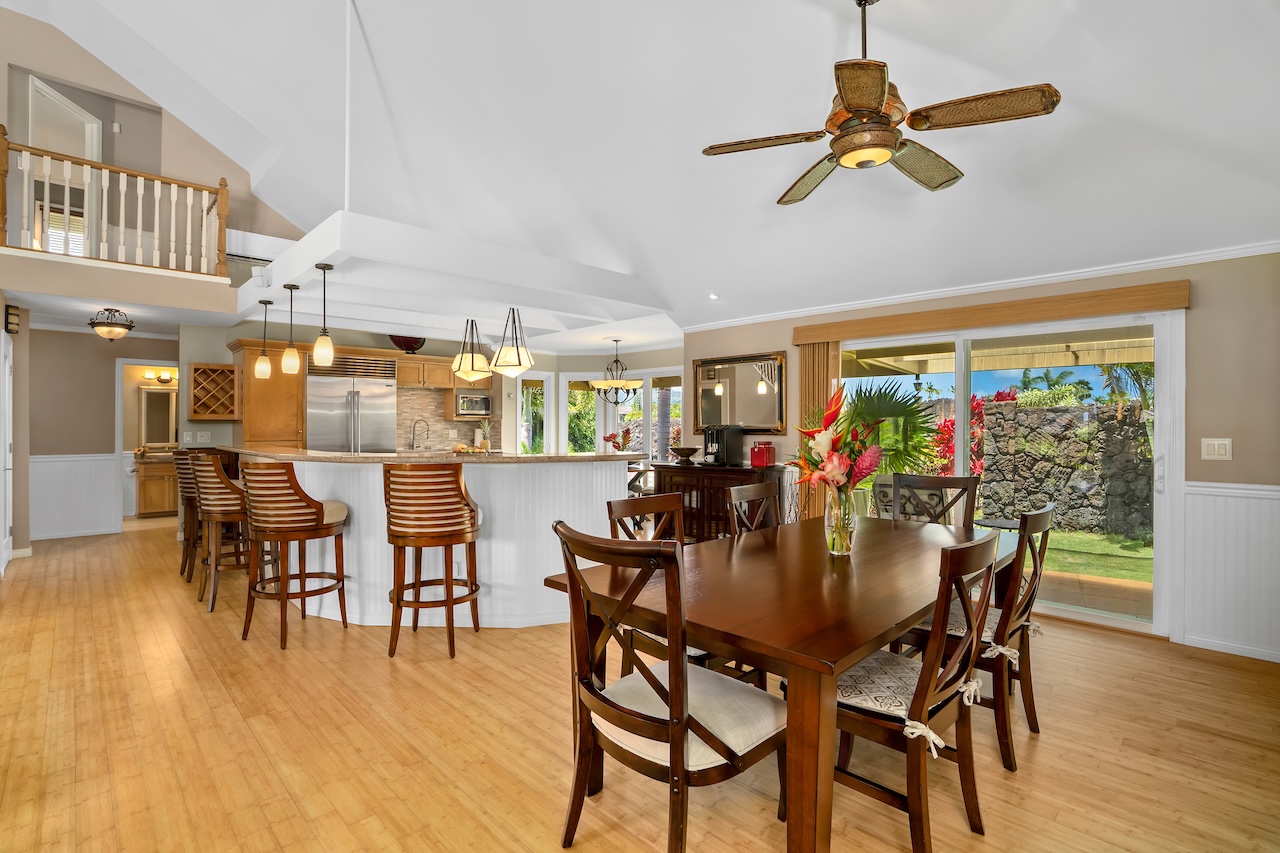 2889 Milo Hae Loop Koloa, HI 96756 - Photo 10 of 27 a view of a dining room with furniture window and wooden floor