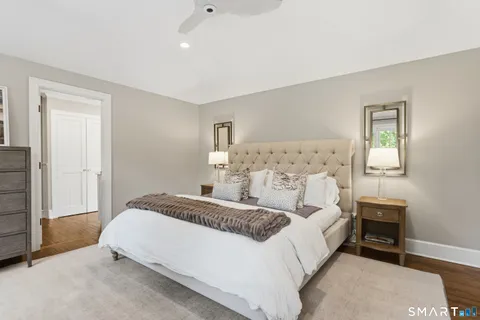 a bedroom with a bed and a cabinets