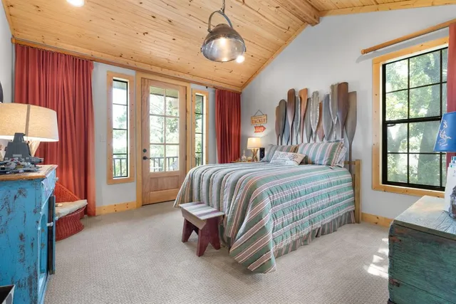 a view of a chair and tables in the balcony