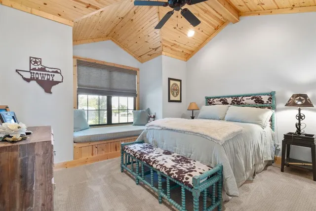 a bed room with a bed and a couch