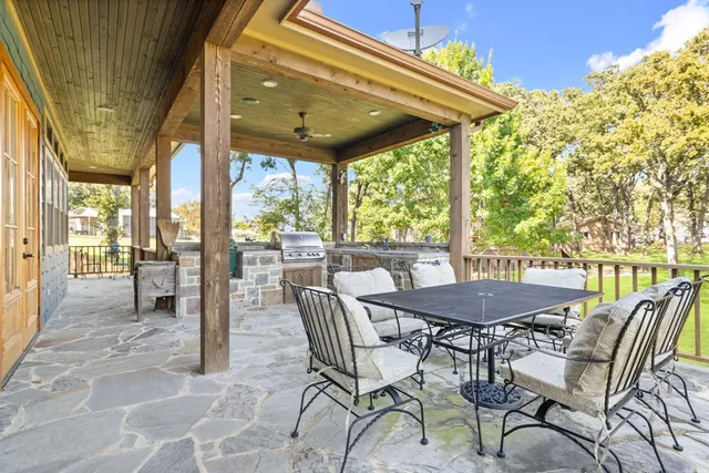 a view of balcony with furniture