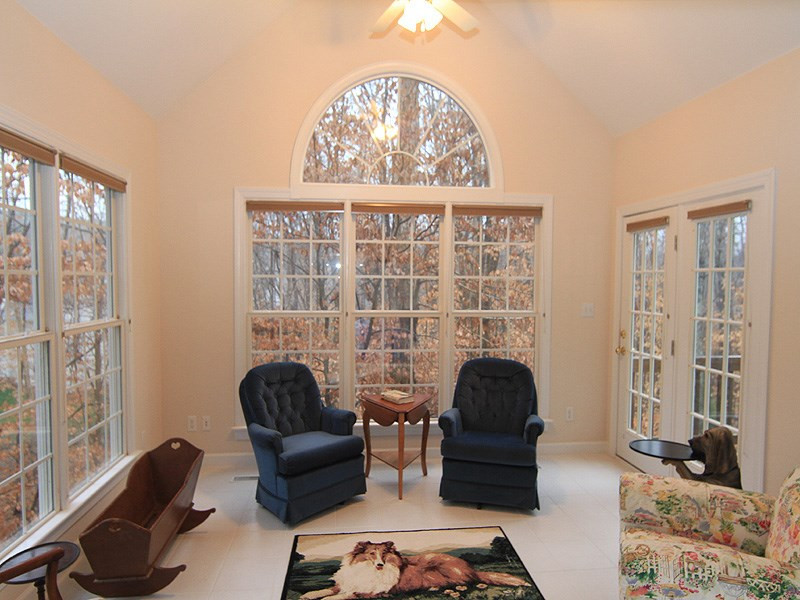 2937 Sunnystone Way Raleigh, NC 27613 - Photo 14 of 25 Great windows on 3 walls for enormous Natural Lighting. Sunroom