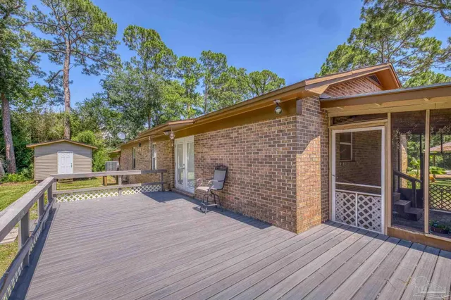a view of house with wooden floor and outdoor space