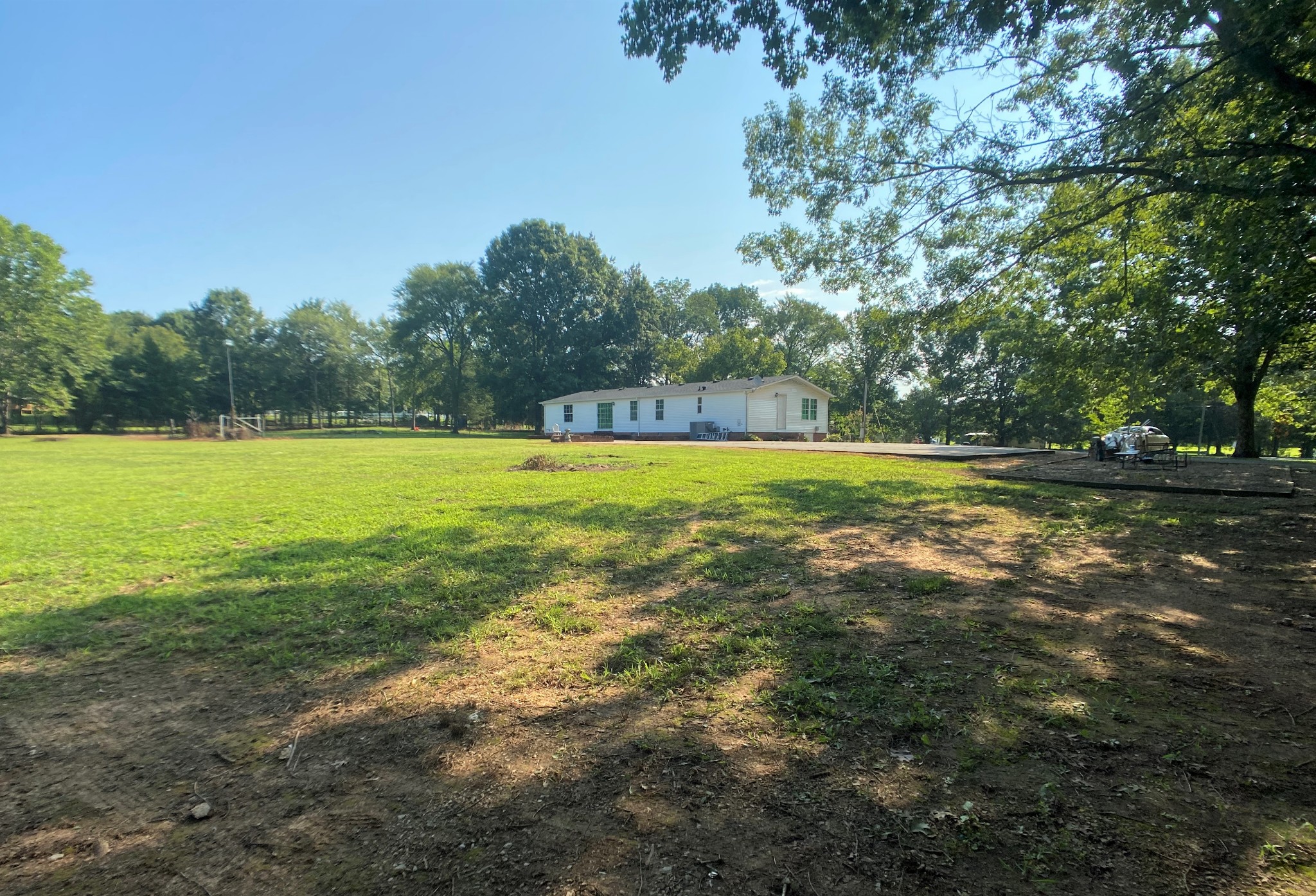 1470 Hamilton Chambers Road Lebanon, TN 37087 - Photo 4 of 8 a view of a big yard with a large trees