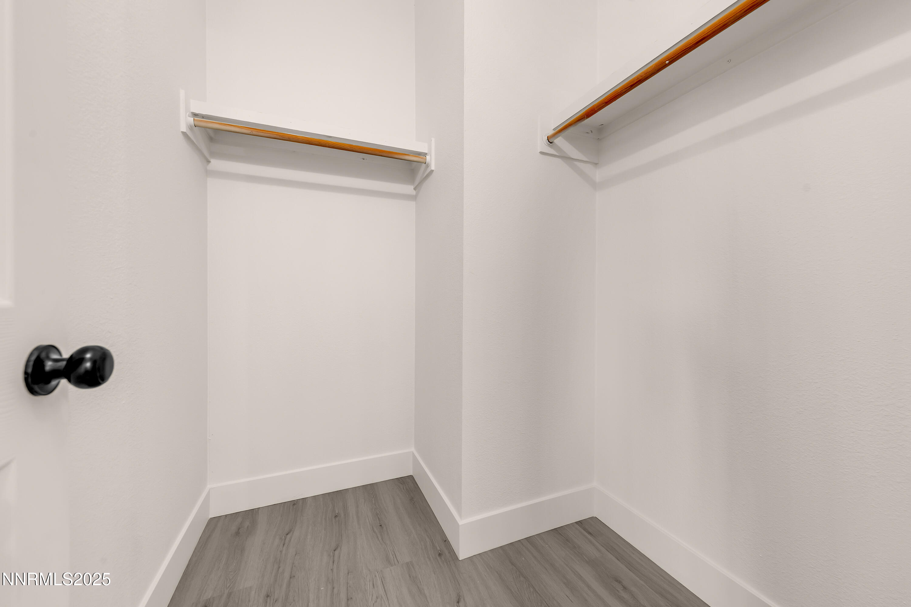 145 Wewoka Way Sun Valley, NV 89433 - Photo 16 of 36 a view of a room with wooden floor and a window