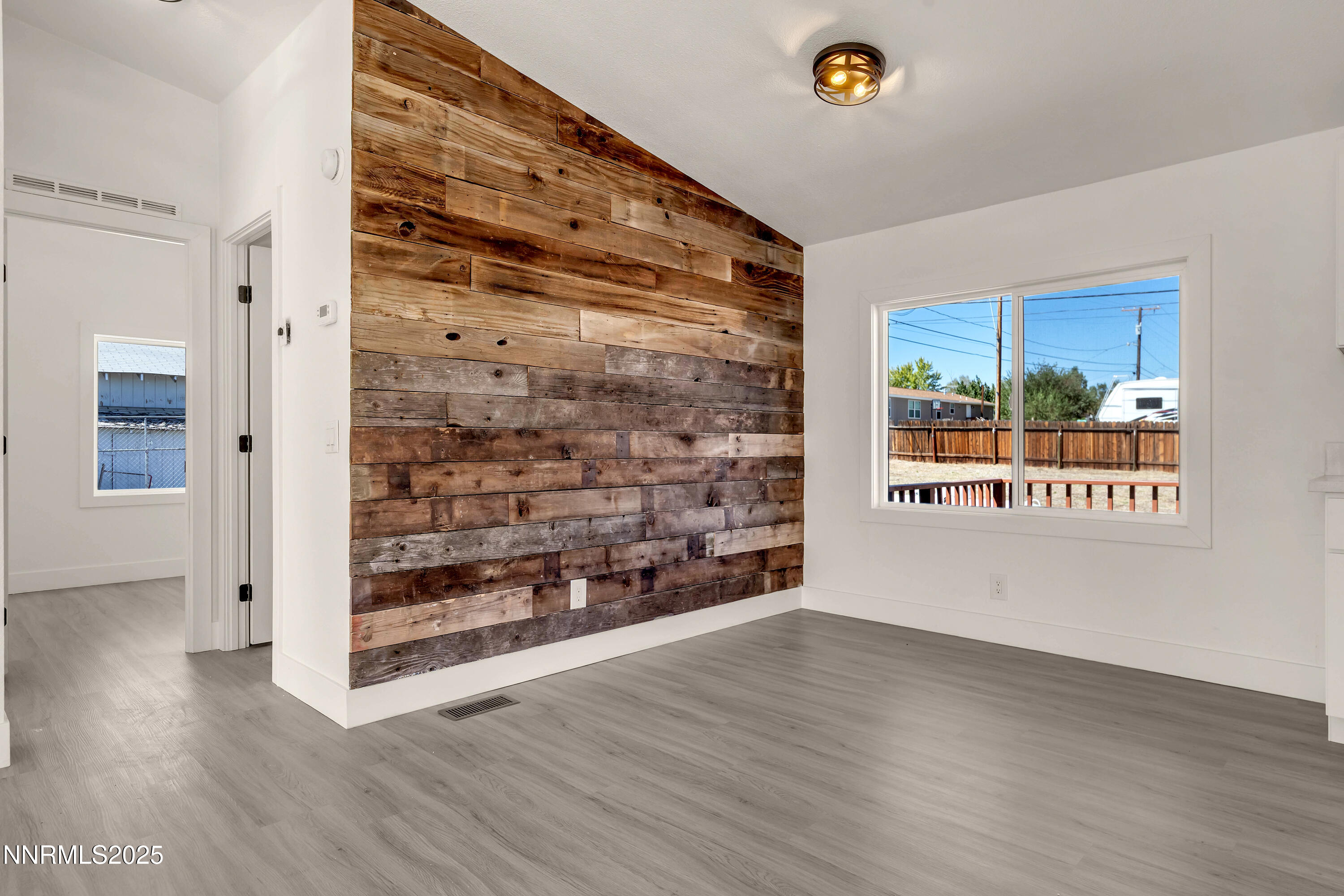 145 Wewoka Way Sun Valley, NV 89433 - Photo 18 of 36 a view of an empty room and window