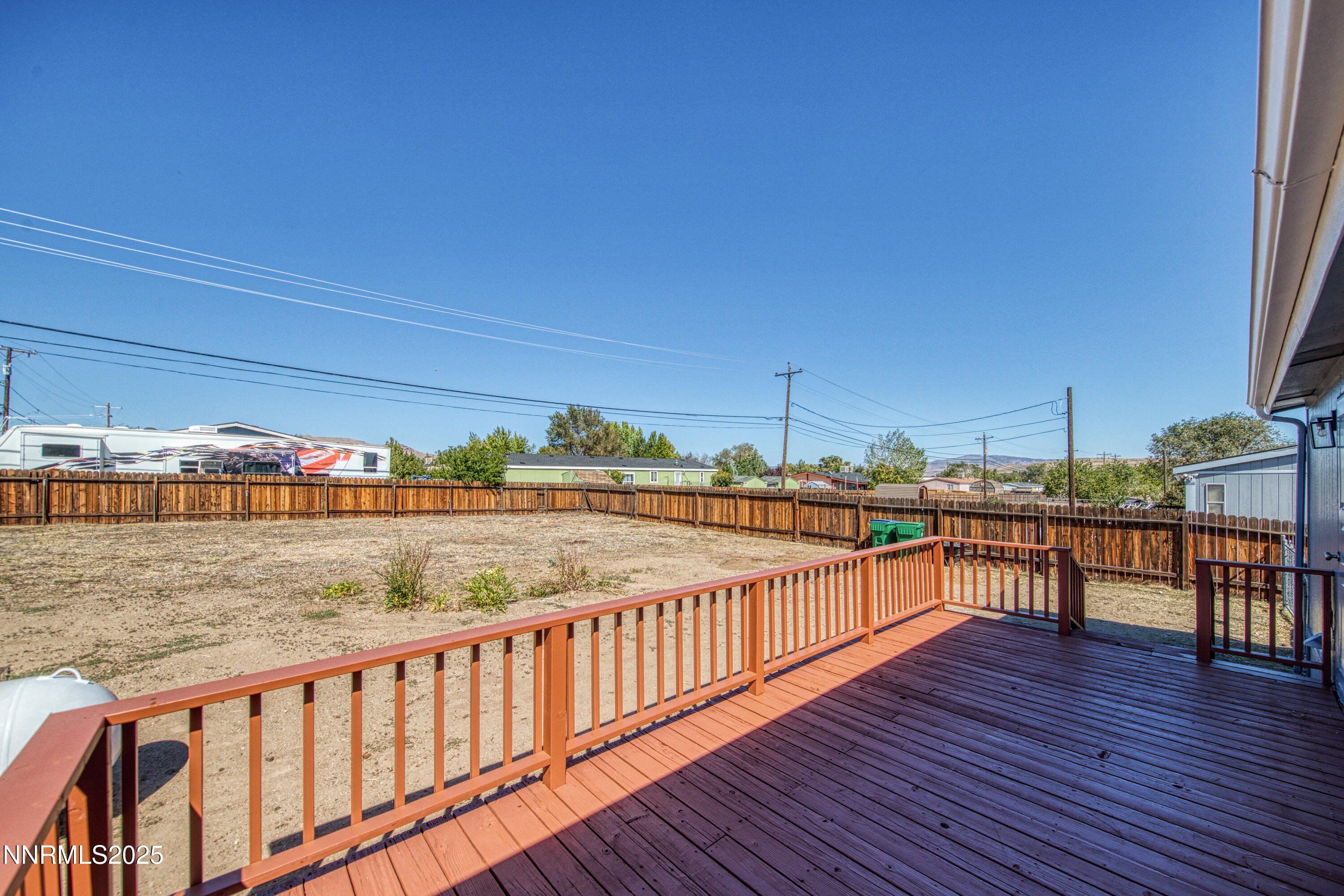 145 Wewoka Way Sun Valley, NV 89433 - Photo 30 of 36 a view of a balcony with wooden floor