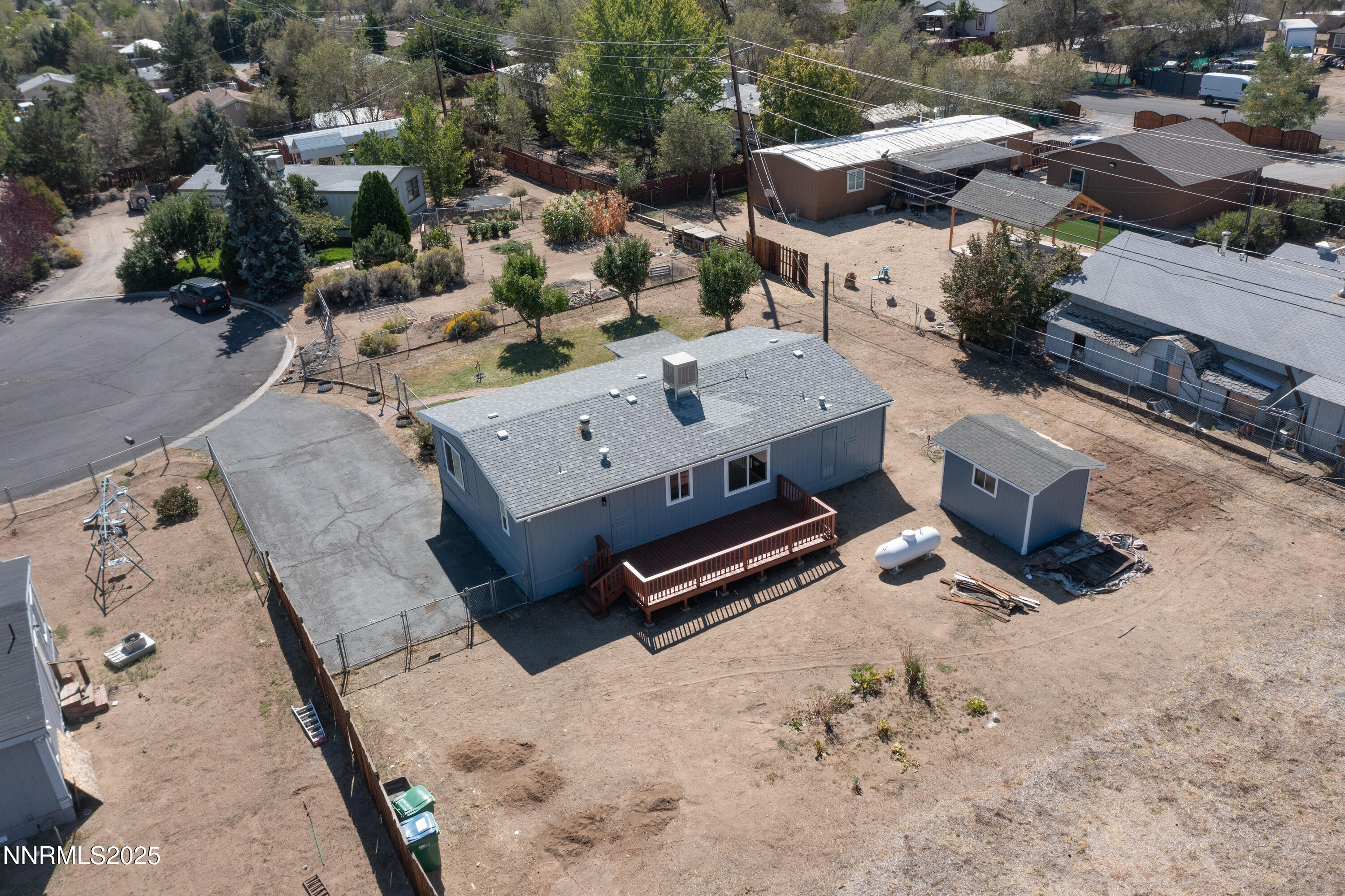 145 Wewoka Way Sun Valley, NV 89433 - Photo 33 of 36 an aerial view of a house with a yard