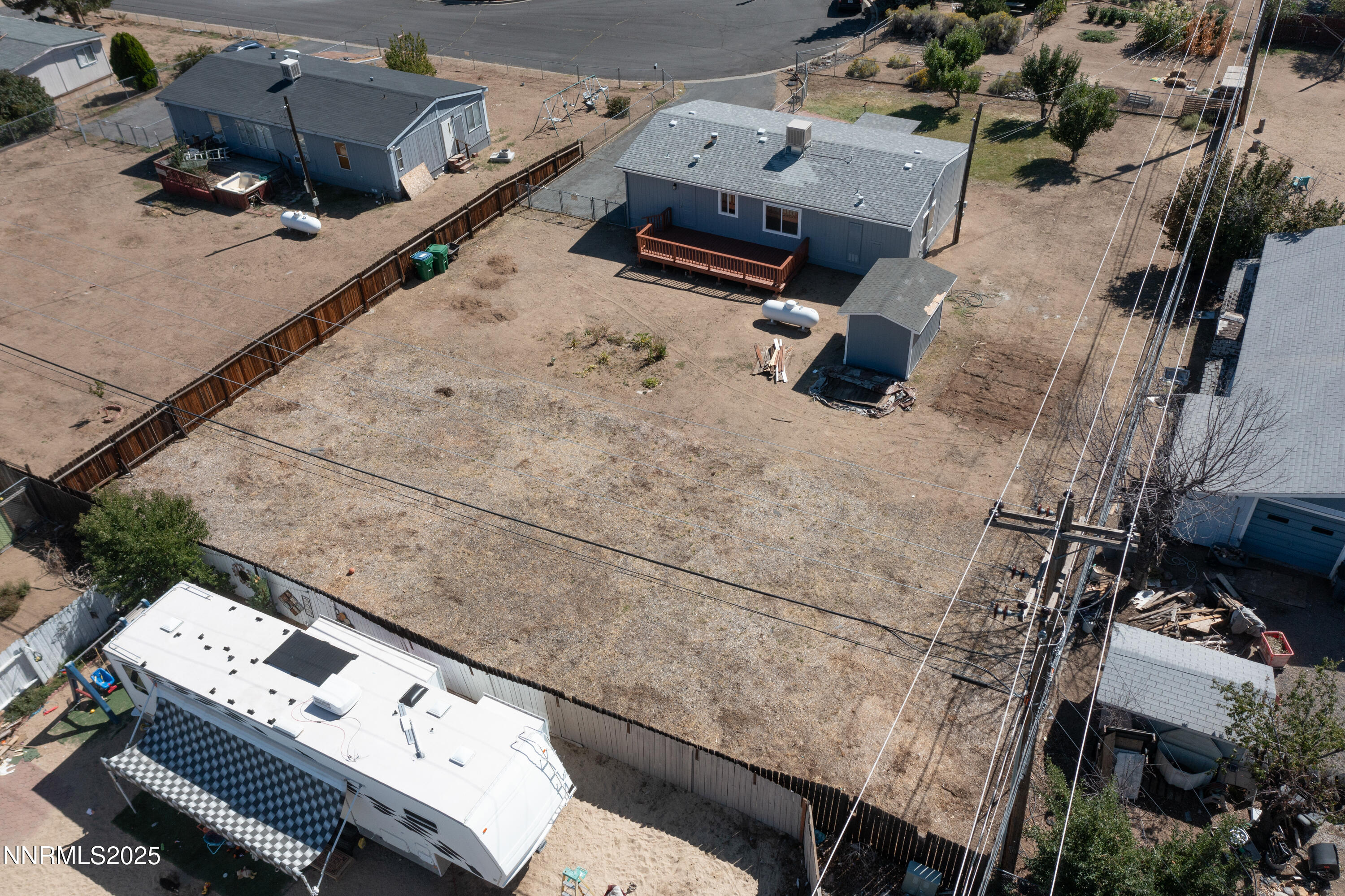145 Wewoka Way Sun Valley, NV 89433 - Photo 34 of 36 an aerial view of a house with outdoor space