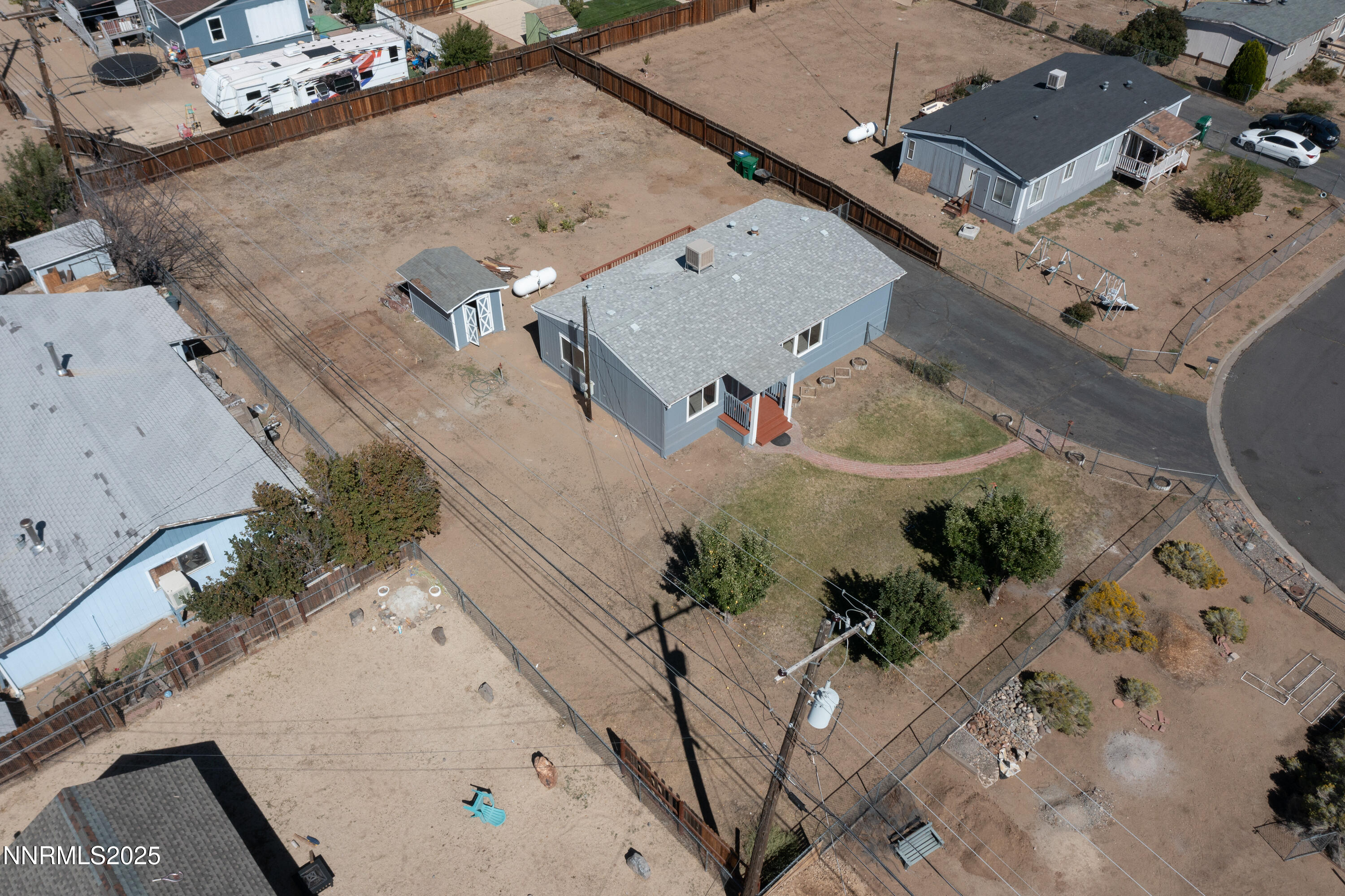 145 Wewoka Way Sun Valley, NV 89433 - Photo 35 of 36 an aerial view of a house with a yard