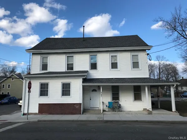 a view of a house with a balcony