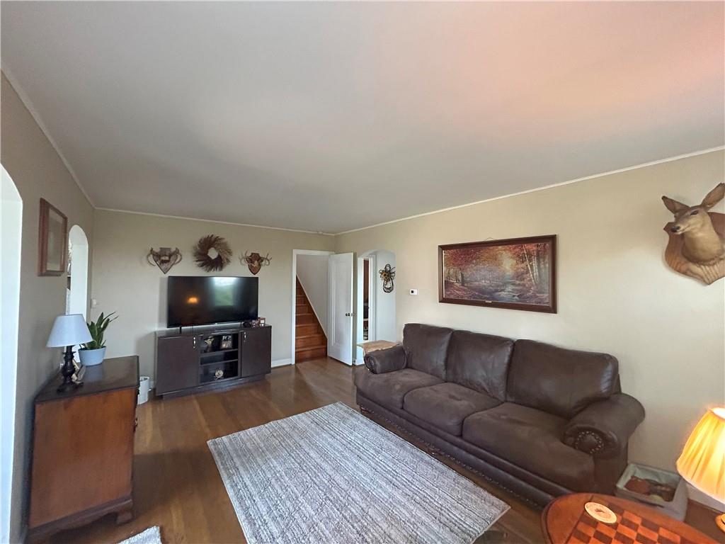 1920 Ridge Rd Extension Ambridge, PA 15003 - Photo 13 of 40 a living room with furniture and a flat screen tv
