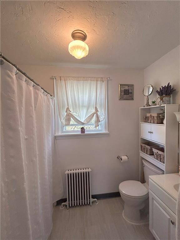 1920 Ridge Rd Extension Ambridge, PA 15003 - Photo 18 of 40 a bathroom with a toilet a sink and a shower