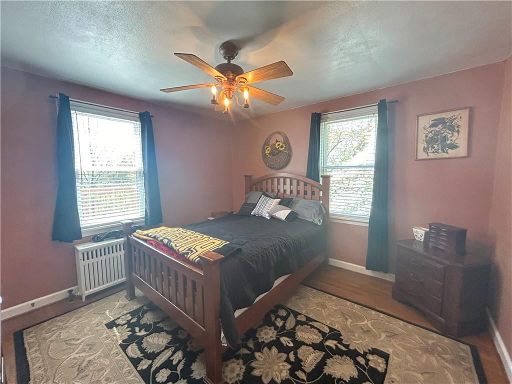 1920 Ridge Rd Extension Ambridge, PA 15003 - Photo 19 of 40 a bedroom with a bed and a window