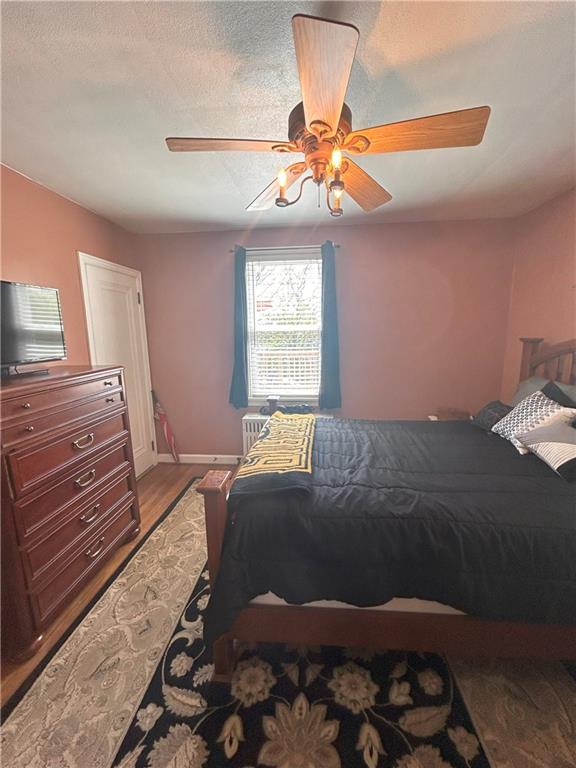 1920 Ridge Rd Extension Ambridge, PA 15003 - Photo 20 of 40 a bedroom with a bed and dresser