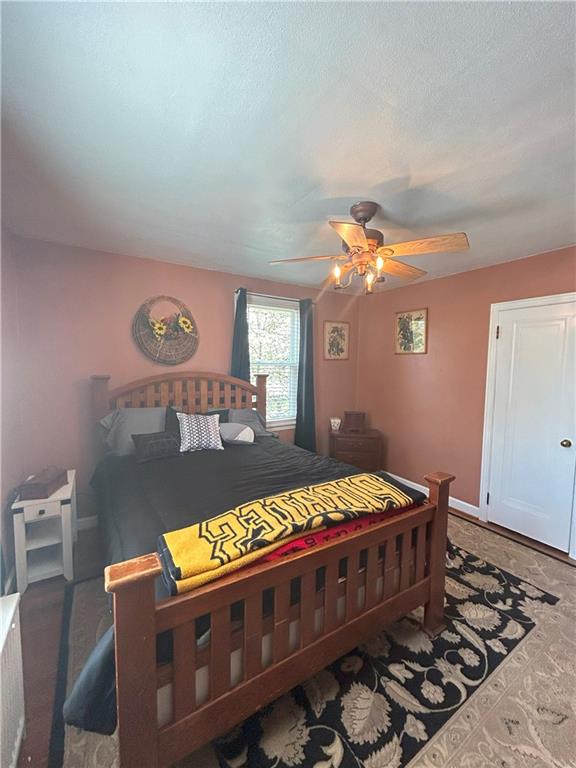 1920 Ridge Rd Extension Ambridge, PA 15003 - Photo 21 of 40 a bed room with a bed window and dresser