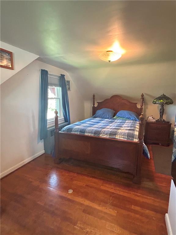 1920 Ridge Rd Extension Ambridge, PA 15003 - Photo 24 of 40 a bed sitting in a bedroom next to a window
