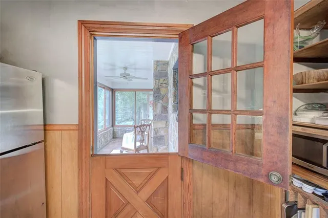 a kitchen that has a sink and a stove in it