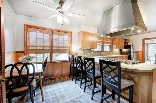 a view of a sink and washer and dryer