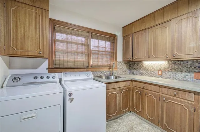 a room with gym equipment and a large window