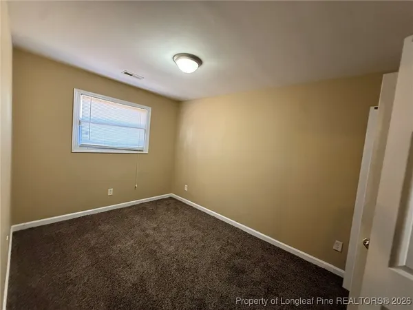 an empty room with a workbench