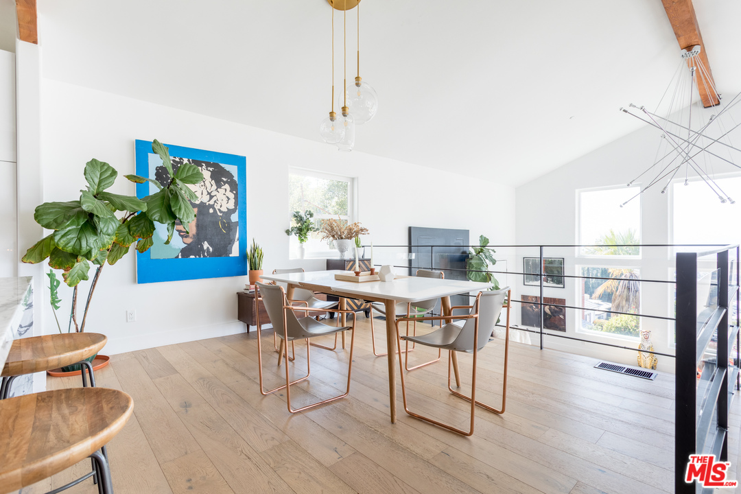 1320 Romulus Drive Glendale, CA 91205 - Photo 12 of 54 a view of a dining room with furniture window and wooden floor