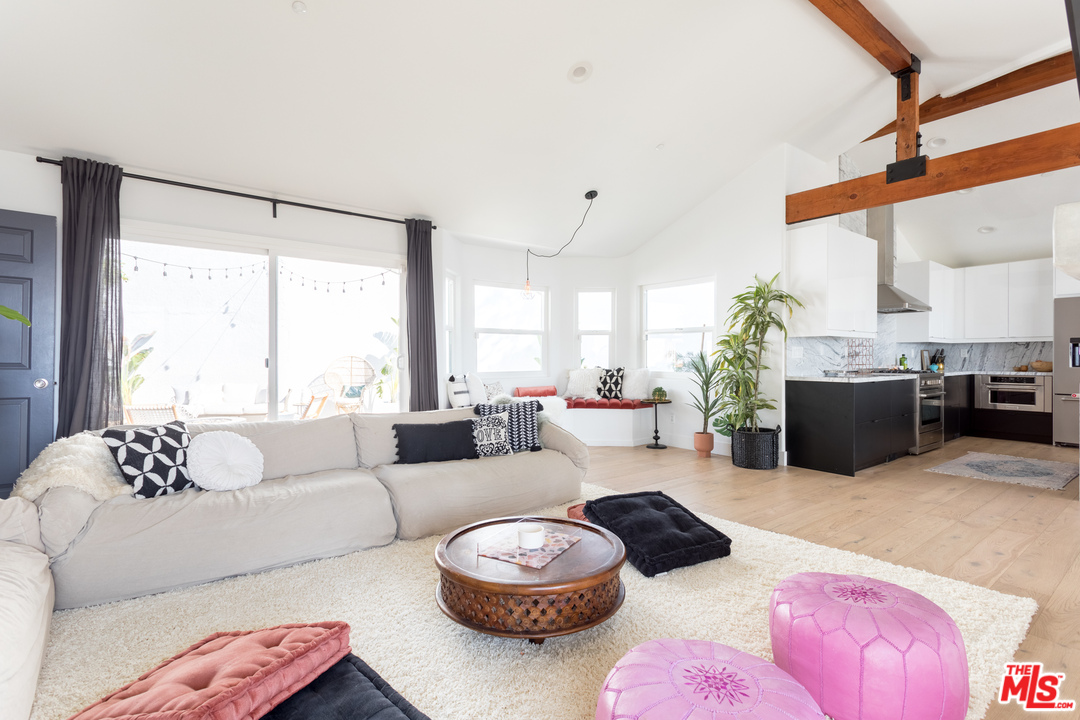 1320 Romulus Drive Glendale, CA 91205 - Photo 20 of 54 a living room with furniture and a large window