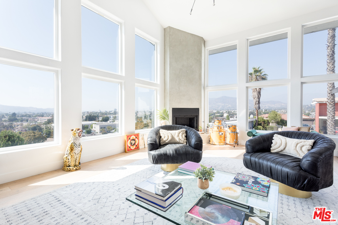 1320 Romulus Drive Glendale, CA 91205 - Photo 3 of 54 a living room with furniture and a large window