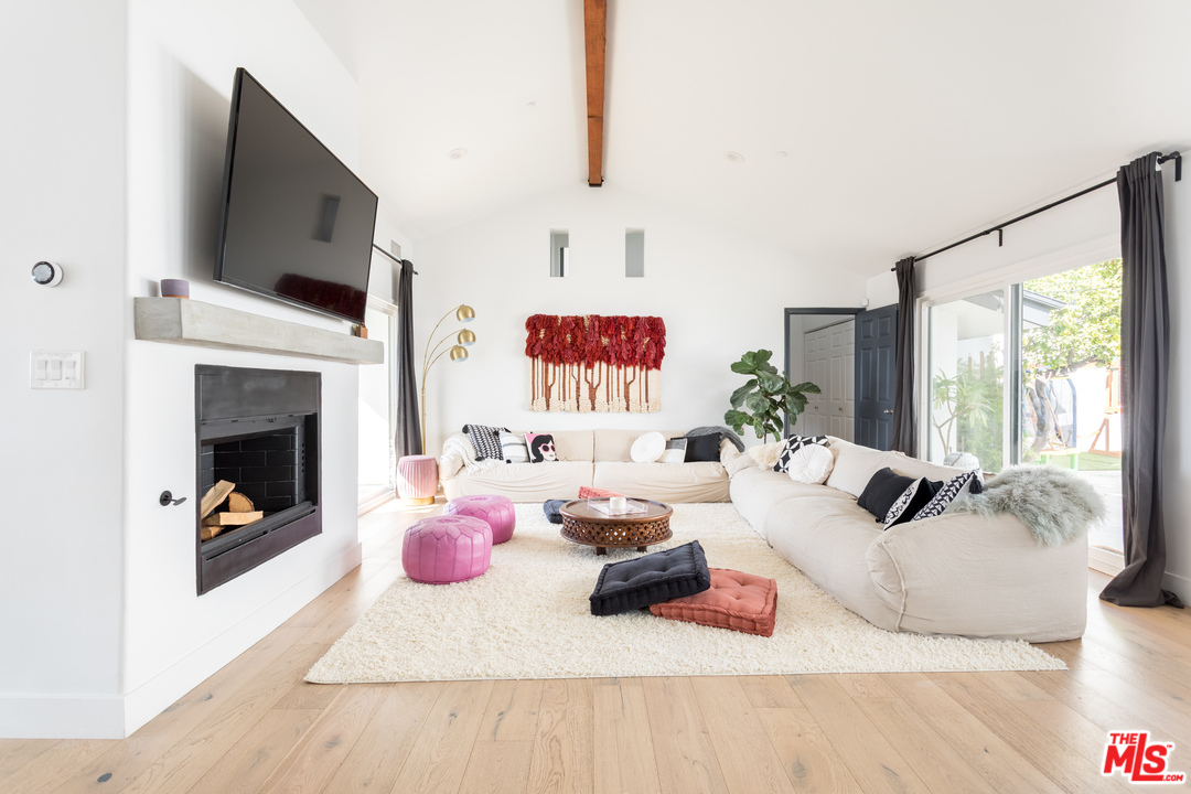 1320 Romulus Drive Glendale, CA 91205 - Photo 21 of 54 a living room with furniture fireplace and flat screen tv