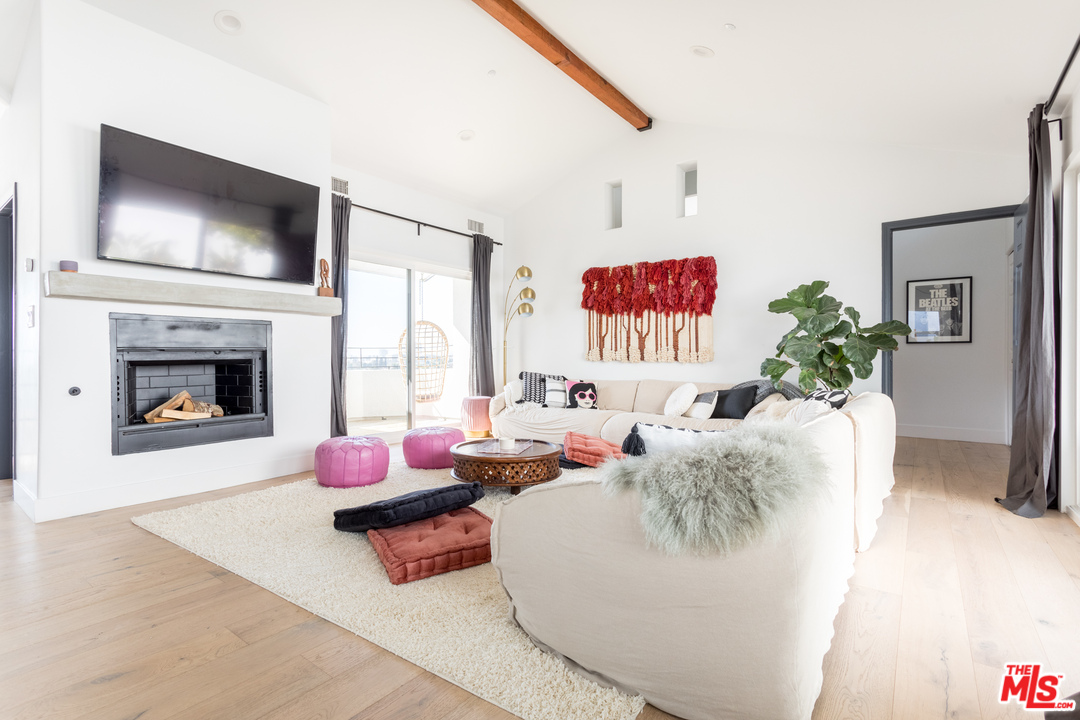 1320 Romulus Drive Glendale, CA 91205 - Photo 22 of 54 a living room with furniture fireplace and flat screen tv