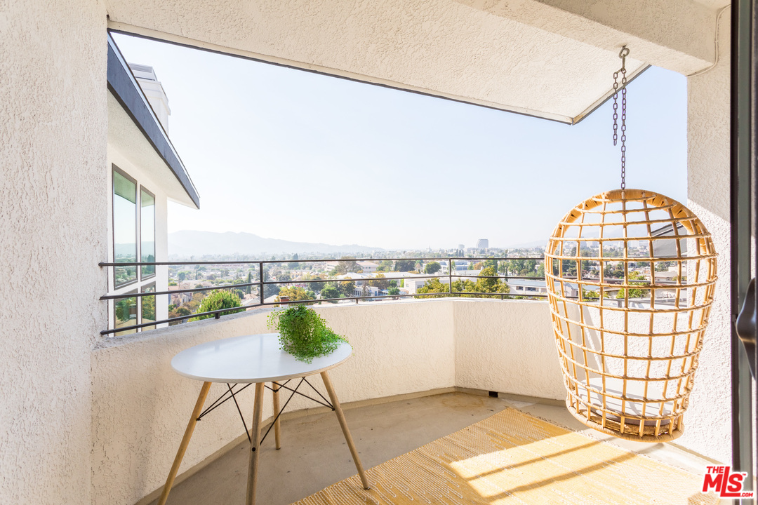 1320 Romulus Drive Glendale, CA 91205 - Photo 24 of 54 a view of a living room and a floor to ceiling window