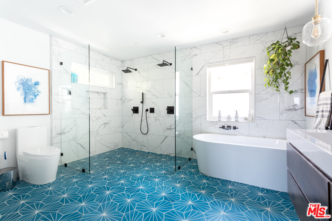 1320 Romulus Drive Glendale, CA 91205 - Photo 37 of 54 a spacious bathroom with a bathtub sink and toilet