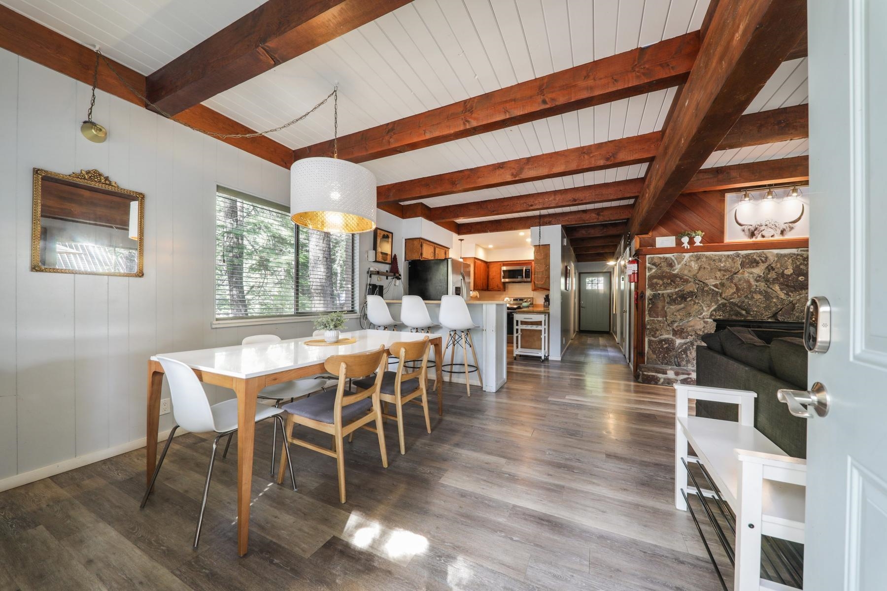 5656 Victoria Road Carnelian Bay, CA 96140 - Photo 6 of 28 a dining room with furniture and wooden floor