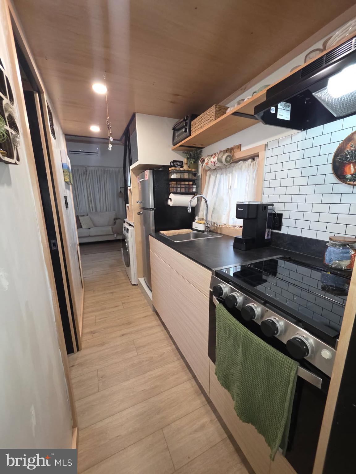 867 Schwanger Road Elizabethtown, PA 17022 - Photo 6 of 14 a kitchen with stainless steel appliances granite countertop a stove and a sink