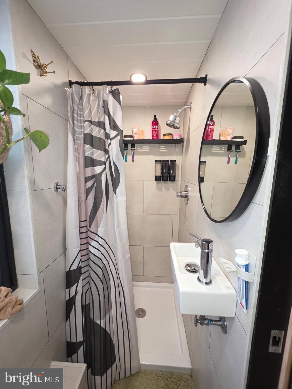 867 Schwanger Road Elizabethtown, PA 17022 - Photo 8 of 14 a bathroom with a sink a toilet and a mirror