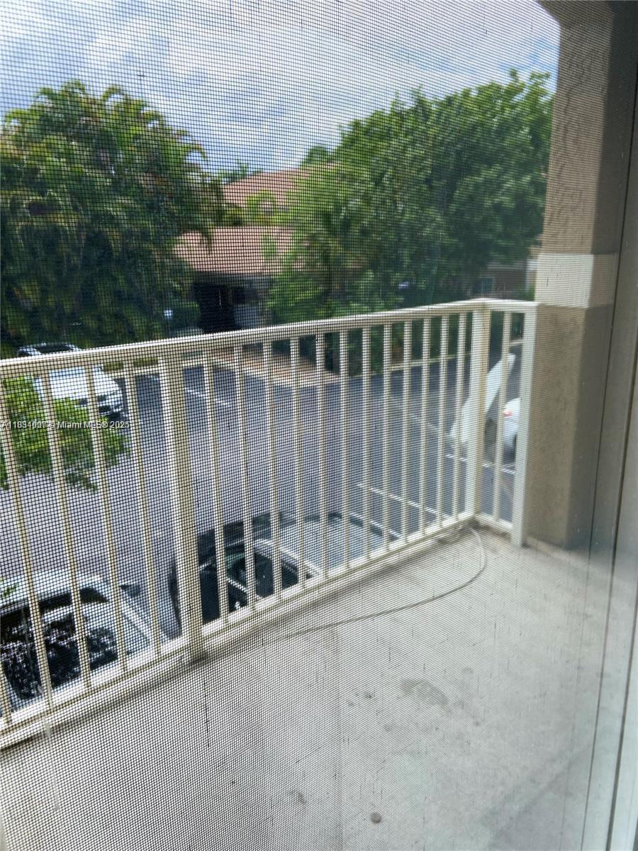 4802 Washington Street, Unit 14 Hollywood, FL 33021 - Photo 6 of 14 a view of outdoor space with porch