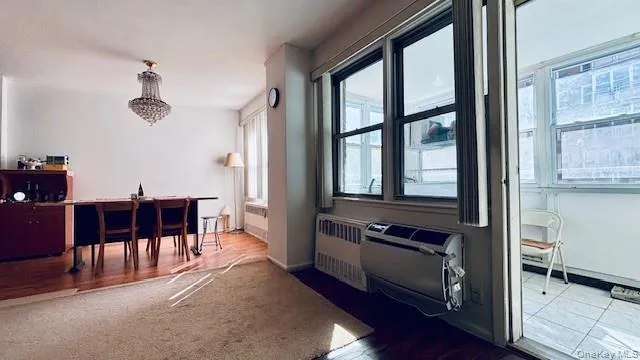 a view of a livingroom with furniture and window