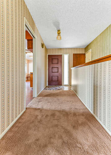 41000 Oak Ridge Drive Three Rivers, CA 93271 - Photo 18 of 39 a view of a hallway with wooden floor and windows