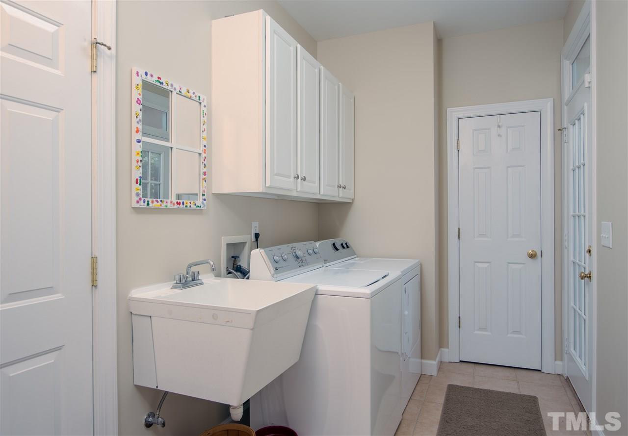5817 Orchid Valley Road Raleigh, NC 27613 - Photo 11 of 25 a room with storage and utility