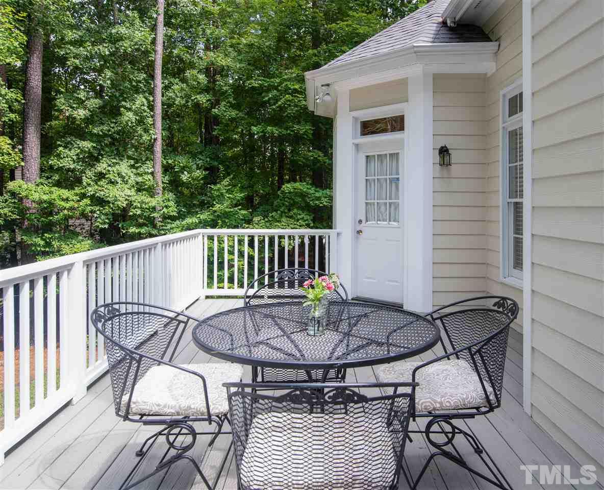 5817 Orchid Valley Road Raleigh, NC 27613 - Photo 21 of 25 a view of a patio in a balcony