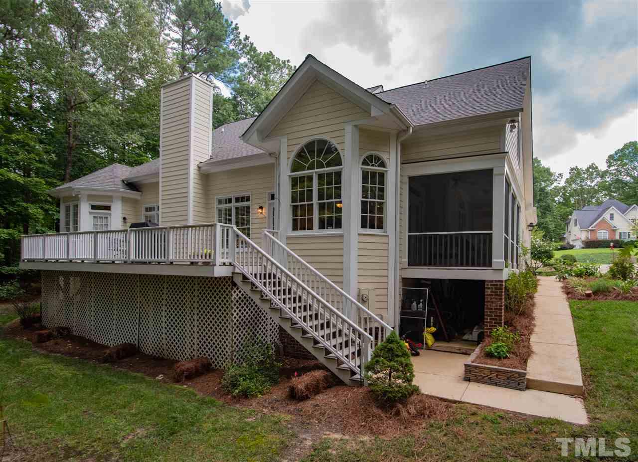 5817 Orchid Valley Road Raleigh, NC 27613 - Photo 24 of 25 a front view of a house with a yard