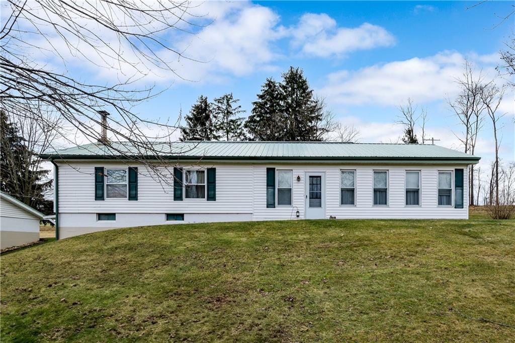 130 Kaiser Road Butler, PA 16002 - Photo 1 of 24 a view of a house with a yard and sitting area